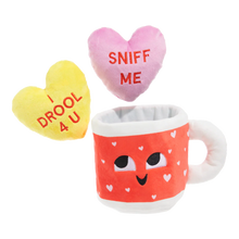Load image into Gallery viewer, Red mug with a smiley face, pink heart pillow, and yellow heart toy on a white background